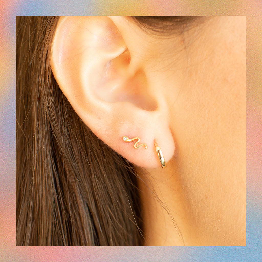 Broquel Serpiente Zirconia Blanca (1pz o par) | Oro 10k | Canario Shop